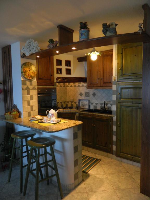 Appartamento Picasso Cala Gonone Bagian luar foto